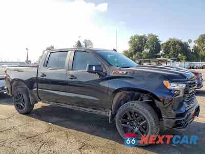 Czwarte zdjęcie samochodu z boku: 2024 CHEVROLET SILVERADO K1500 LT TRAIL BOSS VIN:3GCUDFED5RG239346 - miniatura