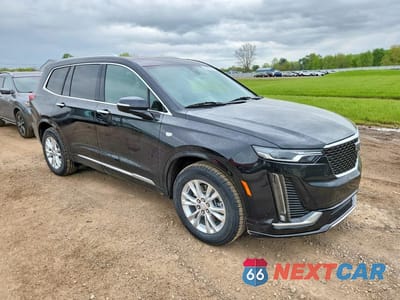 Czwarte zdjęcie samochodu z boku: 2022 CADILLAC XT6 PREMIUM LUXURY VIN:1GYKPDRS8NZ167106 - miniatura
