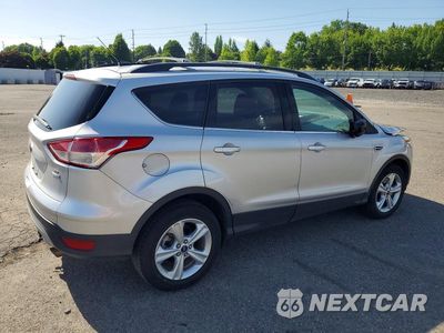 Trzecie zdjęcie samochodu z tyłu: 2016 FORD ESCAPE SE VIN:1FMCU9G91GUC00605 - miniatura