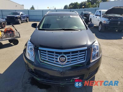 Piąte zdjęcie samochodu w środku: 2016 CADILLAC SRX LUXURY COLLECTION VIN:3GYFNBE32GS514102 - miniatura