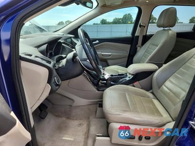 Zdjęcie 7 z 12 samochodu: 2014 FORD ESCAPE TITANIUM VIN:1FMCU9J92EUC86481 - miniatura