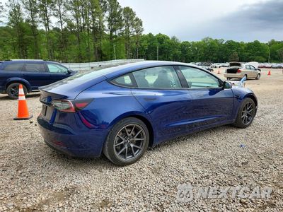 Trzecie zdjęcie samochodu z tyłu: 2021 TESLA MODEL 3 VIN:5YJ3E1EA1MF090014 - miniatura