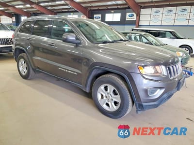 Czwarte zdjęcie samochodu z boku: 2014 JEEP GRAND CHEROKEE LAREDO VIN:1C4RJFAG3EC457703 - miniatura