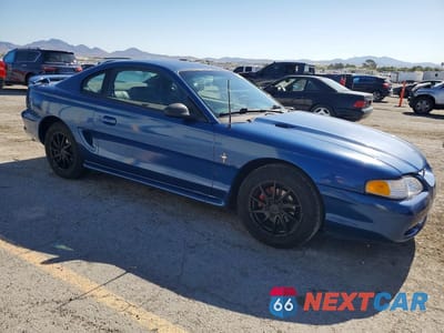 Czwarte zdjęcie samochodu z boku: 1998 FORD MUSTANG VIN:1FAFP4048WF132581 - miniatura