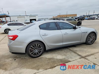 Trzecie zdjęcie samochodu z tyłu: 2016 MASERATI GHIBLI S VIN:ZAM57RSA1G1181072 - miniatura