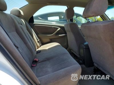Zdjęcie 10 z 12 samochodu: 1999 TOYOTA CAMRY LE VIN:JT2BG22K8X0285550 - miniatura