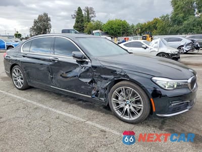 Czwarte zdjęcie samochodu z boku: 2016 BMW 740 I VIN:WBA7E2C52GG738741 - miniatura