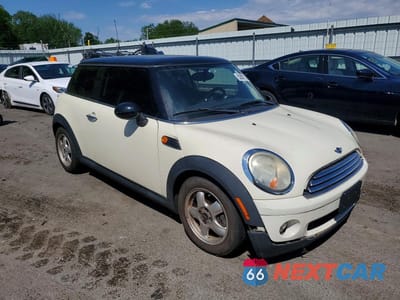 Czwarte zdjęcie samochodu z boku: 2009 MINI COOPER VIN:WMWMF33519TW72988 - miniatura