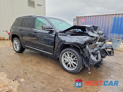 Czwarte zdjęcie samochodu z boku: 2023 JEEP GRAND CHEROKEE SUMMIT VIN:1C4RJHEG5PC563403 - miniatura