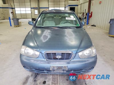 Piąte zdjęcie samochodu w środku: 2003 HYUNDAI ELANTRA GLS VIN:KMHDN45D33U646664 - miniatura