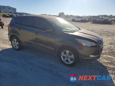 Czwarte zdjęcie samochodu z boku: 2015 FORD ESCAPE SE VIN:1FMCU0GX3FUA98961 - miniatura