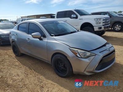 Czwarte zdjęcie samochodu z boku: 2016 SCION IA BASE VIN:3MYDLBZV8GY104448 - miniatura
