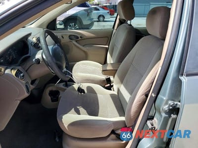 Zdjęcie 7 z 12 samochodu: 2003 FORD FOCUS SE VIN:1FAFP34P23W227986 - miniatura