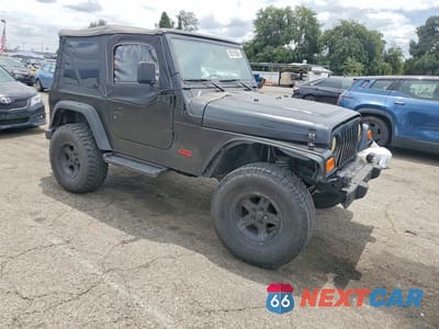 Czwarte zdjęcie samochodu z boku: 2002 JEEP WRANGLER / TJ SPORT VIN:1J4FA49S62P719289 - miniatura