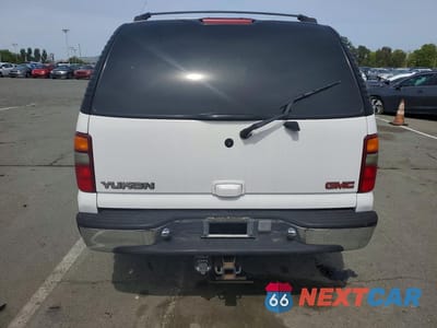 Zdjęcie 6 z 13 samochodu: 2000 GMC YUKON VIN:1GKEK13TXYJ177113 - miniatura