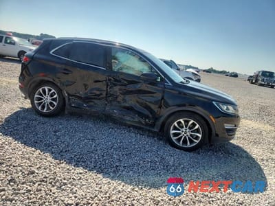 Czwarte zdjęcie samochodu z boku: 2017 LINCOLN MKC SELECT VIN:5LMCJ2C92HUL04895 - miniatura