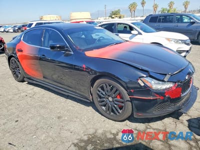 Czwarte zdjęcie samochodu z boku: 2016 MASERATI GHIBLI VIN:ZAM57XSA1G1183182 - miniatura