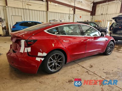 Trzecie zdjęcie samochodu z tyłu: 2018 TESLA MODEL 3 VIN:5YJ3E1EA6JF004630 - miniatura
