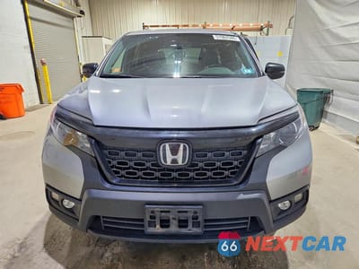 Piąte zdjęcie samochodu w środku: 2020 HONDA PASSPORT EXL VIN:5FNYF8H50LB008850 - miniatura