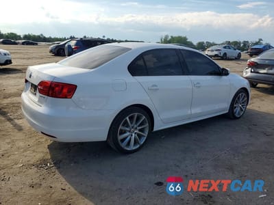 Trzecie zdjęcie samochodu z tyłu: 2011 VOLKSWAGEN JETTA SE VIN:3VWDZ7AJ1BM373598 - miniatura