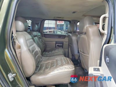 Zdjęcie 11 z 13 samochodu: 2003 HUMMER H2 VIN:5GRGN23U33H101063 - miniatura