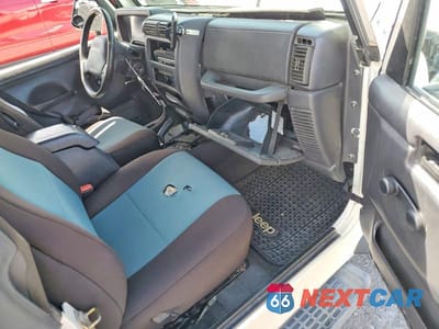 Zdjęcie 8 z 13 samochodu: 2002 JEEP WRANGLER / TJ SPORT VIN:1J4FA49S92P755378 - miniatura