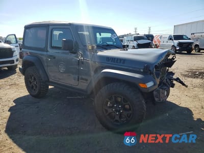 Czwarte zdjęcie samochodu z boku: 2022 JEEP WRANGLER SPORT VIN:1C4GJXAG5NW250208 - miniatura