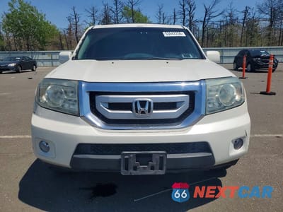 Piąte zdjęcie samochodu w środku: 2011 HONDA PILOT TOURING VIN:5FNYF4H95BB026299 - miniatura