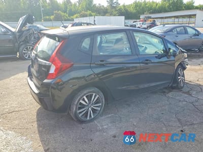 Trzecie zdjęcie samochodu z tyłu: 2015 HONDA FIT EX VIN:3HGGK5G86FM765321 - miniatura