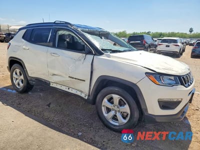 Czwarte zdjęcie samochodu z boku: 2019 JEEP COMPASS LATITUDE VIN:3C4NJDBB2KT703341 - miniatura