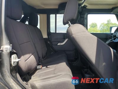 Zdjęcie 10 z 12 samochodu: 2016 JEEP WRANGLER UNLIMITED SAHARA VIN:1C4BJWEG3GL248489 - miniatura