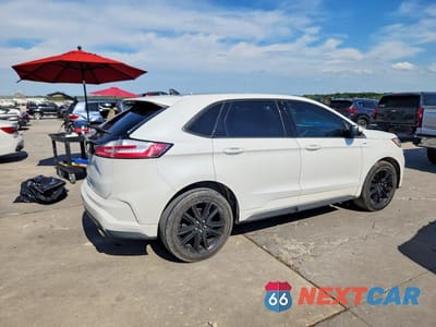 Trzecie zdjęcie samochodu z tyłu: 2020 FORD EDGE ST VIN:2FMPK3J95LBB52927 - miniatura