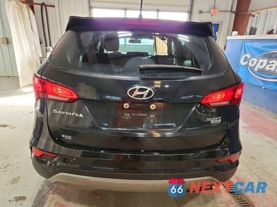 Zdjęcie 6 z 12 samochodu: 2018 HYUNDAI SANTA FE SPORT 2.4L VIN:5NMZTDLB7JH064945 - miniatura