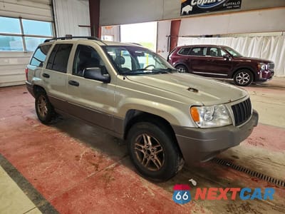 Czwarte zdjęcie samochodu z boku: 2004 JEEP GRAND CHEROKEE LAREDO VIN:1J4GW48S44C125012 - miniatura