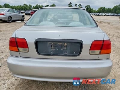 Zdjęcie 6 z 13 samochodu: 1999 HONDA CIVIC LX VIN:1HGEJ6678XL058068 - miniatura