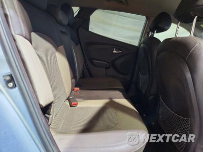 Zdjęcie 11 z 13 samochodu: 2013 HYUNDAI TUCSON GLS VIN:KM8JUCAC5DU693824 - miniatura