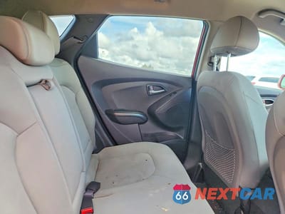 Zdjęcie 11 z 13 samochodu: 2014 HYUNDAI TUCSON GLS VIN:KM8JT3AF7EU803903 - miniatura