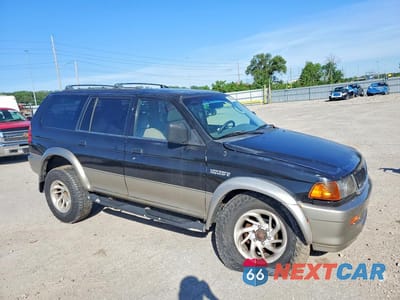 Czwarte zdjęcie samochodu z boku: 1997 MITSUBISHI MONTERO SPORT LS VIN:JA4MT31P8VP003193 - miniatura