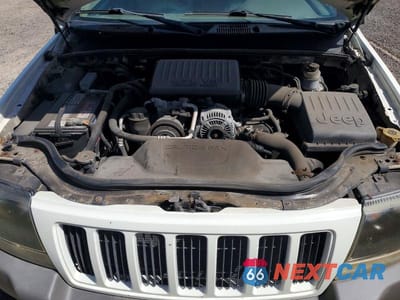 Zdjęcie 12 z 13 samochodu: 2004 JEEP GRAND CHEROKEE LAREDO VIN:1J4GW48N84C378439 - miniatura