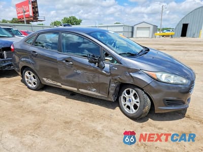 Czwarte zdjęcie samochodu z boku: 2015 FORD FIESTA SE VIN:3FADP4BJ7FM161709 - miniatura