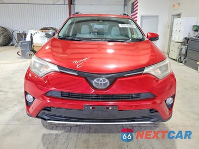 Piąte zdjęcie samochodu w środku: 2016 TOYOTA RAV 4 VIN:JTMWFREV5GJ086637 - miniatura