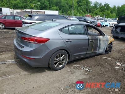 Trzecie zdjęcie samochodu z tyłu: 2018 HYUNDAI ELANTRA VALUE EDITION VIN:5NPD84LF0JH270688 - miniatura