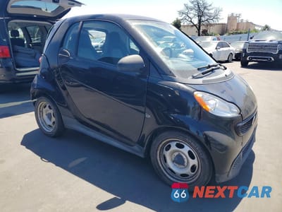 Czwarte zdjęcie samochodu z boku: 2015 SMART FORTWO PURE VIN:WMEEJ3BA6FK812752 - miniatura