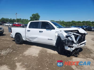 Czwarte zdjęcie samochodu z boku: 2023 RAM 1500 LARAMIE VIN:1C6SRFJT0PN542634 - miniatura