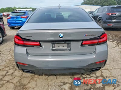 Zdjęcie 6 z 13 samochodu: 2021 BMW M550XI VIN:WBA13BK03MCF11162 - miniatura