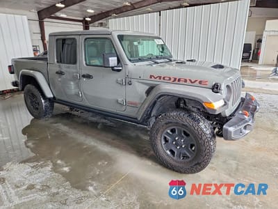 Czwarte zdjęcie samochodu z boku: 2023 JEEP GLADIATOR MOJAVE VIN:1C6JJTEG4PL529931 - miniatura