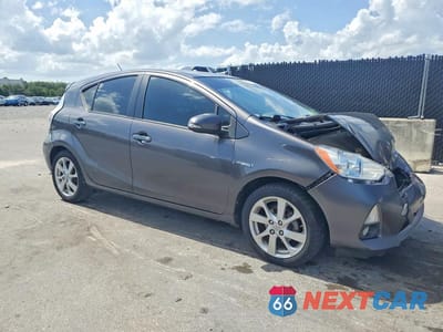 Czwarte zdjęcie samochodu z boku: 2012 TOYOTA PRIUS C FOUR VIN:JTDKDTB37C1005961 - miniatura