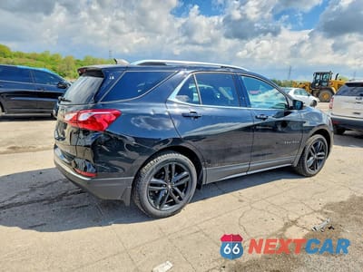 Trzecie zdjęcie samochodu z tyłu: 2020 CHEVROLET EQUINOX LT VIN:3GNAXUEV1LL187100 - miniatura