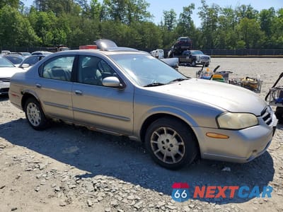Czwarte zdjęcie samochodu z boku: 2000 NISSAN MAXIMA GXE VIN:JN1CA31D6YT709946 - miniatura