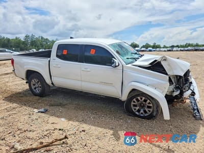 Czwarte zdjęcie samochodu z boku: 2019 TOYOTA TACOMA SR5 V6 VIN:5TFAZ5CNXKX075815 - miniatura